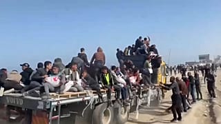 Gazans chase humanitarian aid convoys in Gaza, Wednesday, March 6, 2024.