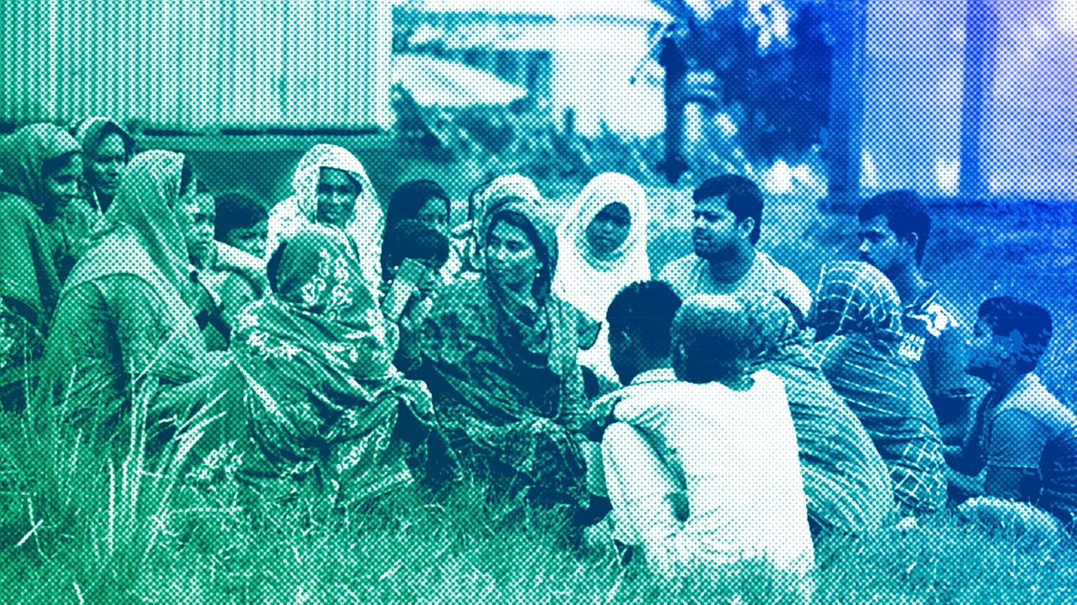 Rehana, a Resilience Agent in Bangladesh, sharing updates on flood events with her local community