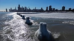 A layer of ice covers Lake Michigan, 2 February 2023, in Chicago. 