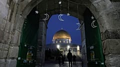 Muslims walk next to the Dome of Rock Mosque at the Al-Aqsa Mosque compound in Jerusalem's Old City, Sunday, 10 March, 2024