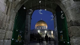 Muslims walk next to the Dome of Rock Mosque at the Al-Aqsa Mosque compound in Jerusalem's Old City, Sunday, 10 March, 2024