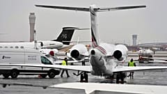 Planes are parked at a private jet terminal at Harry Reid International Airport ahead of the Super Bowl, 1 February 2024, in Las Vegas.