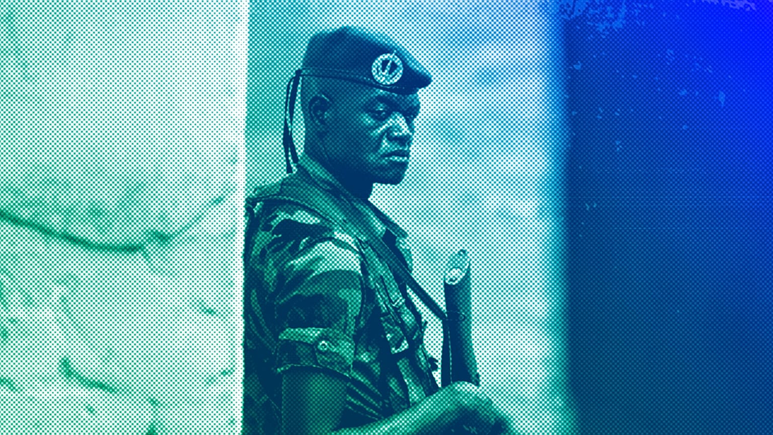 A soldier from the Central African Republic stands guard at a building used for joint meetings between them and US Army special forces, in Obo, April 2012
