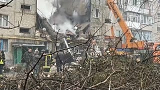 Rescuers work to save lives following a Russian missile strike in the Dontesk region. 