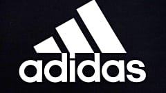 An Adidas logo is displayed on a shoe box in Vernon Hills, Ill., Tuesday, Oct 25, 2022. 