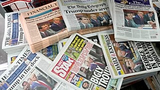 A selection of UK national newspapers displayed in a newsstand in London. April 5, 2023.
