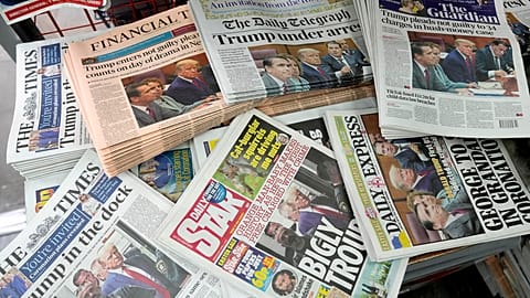 A selection of UK national newspapers displayed in a newsstand in London. April 5, 2023.