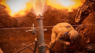 Ukrainian servicemen of the 28th Separate Mechanised Brigade fires a 122mm mortar towards Russian positions at the front line, near Bakhmut, Donetsk region, Ukraine, 3/3/24.