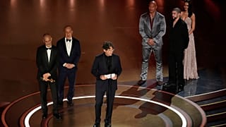 James Wilson, from left, Leonard Blavatnik, and Jonathan Glazer accept the award for "The Zone of Interest' for Best International Feature