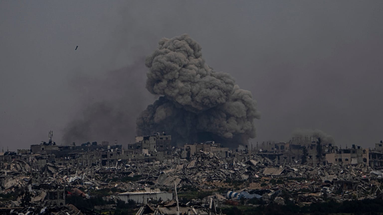 Smoke and explosions rise inside the Gaza Strip, as seen from southern Israel, Sunday, Sunday, March 17, 2024.