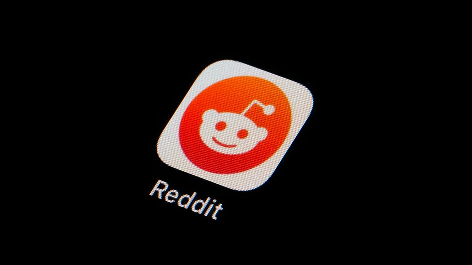 The Reddit app icon is seen on a smartphone on Feb. 28, 2023.
