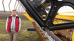 Piotr Korycki, a 34-year-old Polish farmer, walks past machinery on his farm in Cywiny Wojskie, Poland, on Monday March 18, 2024.