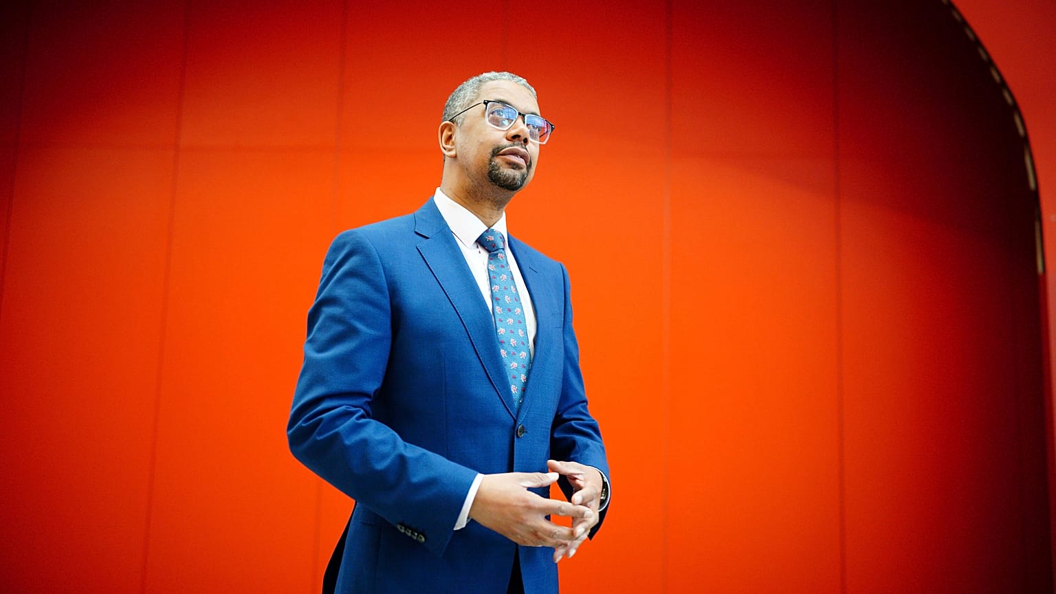 Vaughan Gething poses for a photo, in a lecture hall at Cardiff University, after being elected as the next Welsh Labour leader and First Minister of Wales, in Cardiff, 