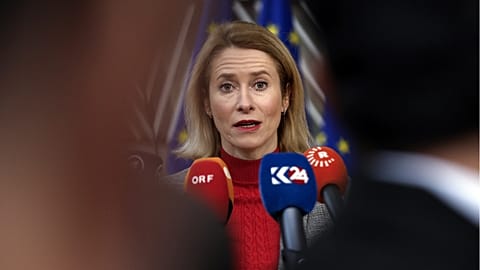 Estonia's Prime Minister Kaja Kallas talks to journalists as he arrives for an EU summit in Brussels, Feb. 1, 2024.