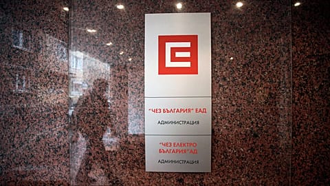 Reflection of a person is seen at the entrance of CEZ headquarters in Sofia, on Feb. 27, 2013.