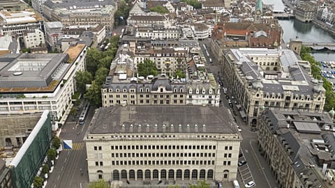 The Swiss National Bank's building, front, in Zurich, Switzerland, on Thursday, June 22, 2023.