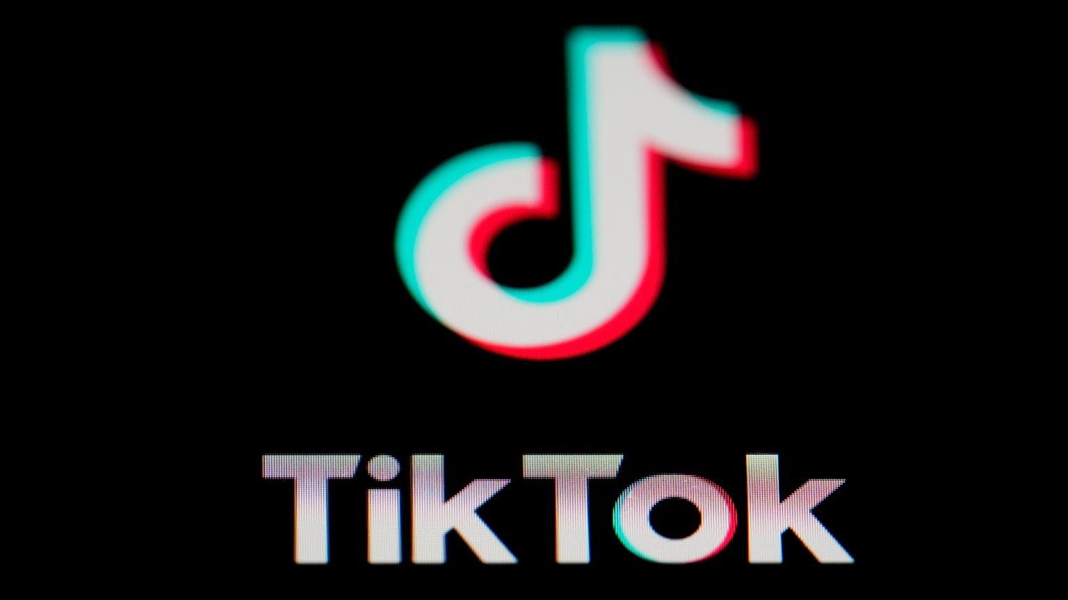The icon for the video sharing TikTok app is seen on a smartphone.