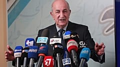  Algeria's President Abdelmajid Tebboune gives a press conference, in Algiers, Algeria, Sunday, 24, 2019.