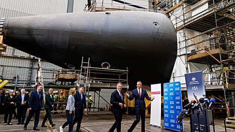 UK, US and Australian officials during a visit to the Osborne Naval Shipyard in Adelaide, Australia, Friday, March 22, 2024.