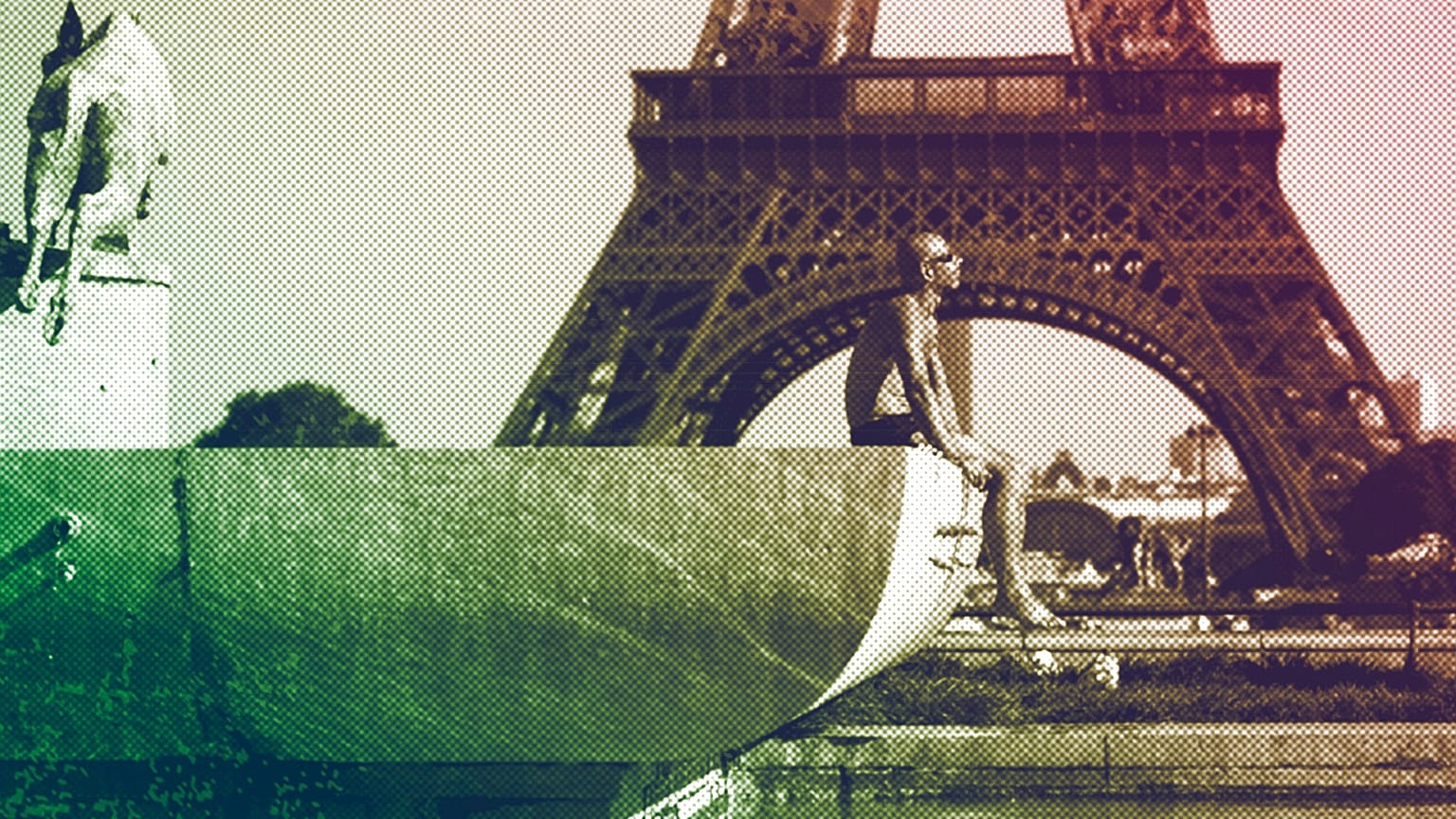 A man sunbaths at the Trocadero fountains in front of the Eiffel Tower, September 2023