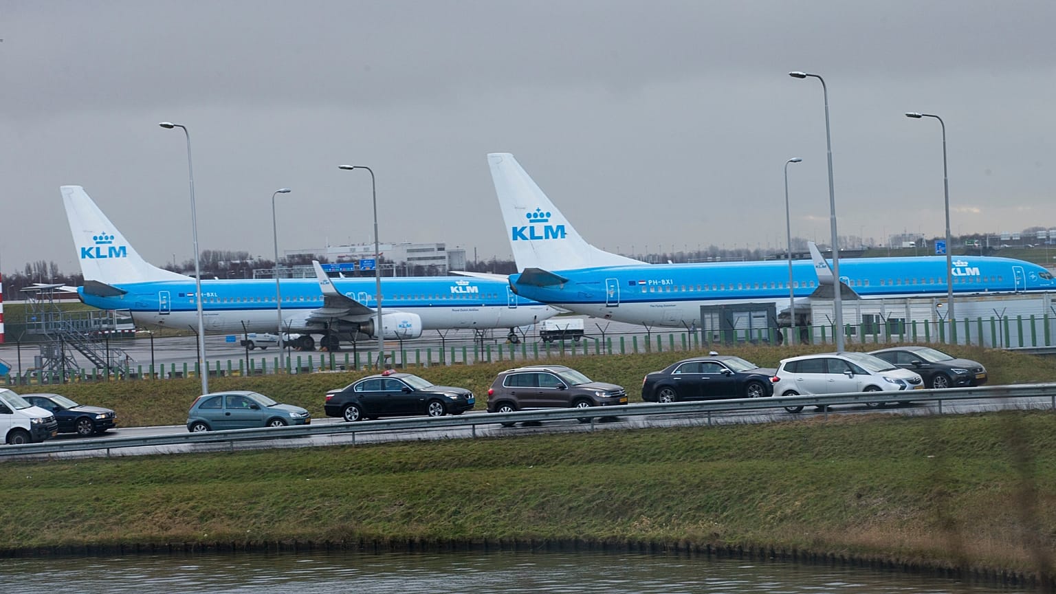 KLM airplanes sit in Schiphol Airport near Amsterdam, Netherlands.