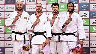 Медалисты в весовой категории свыше 100 кг: Ушанги Кокаури, Гурам Тушишвили, Саба Инанеишвили и Энди Гранда