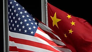 he American and Chinese flags wave at Genting Snow Park ahead of the 2022 Winter Olympics, Feb. 2, 2022, in Zhangjiakou, China. 