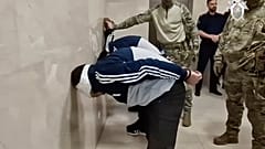 Photo taken from video released by Investigative Committee of Russia, shows suspects in the Crocus City Hall shooting