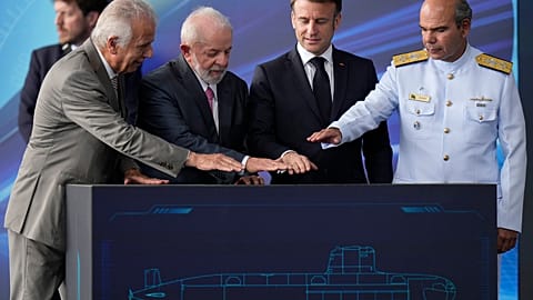 France's President Emmanuel Macron and Brazilian President Luiz Inacio Lula da Silva  symbolically activate the submarine during the launch ceremony March 27, 2024.