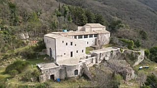Imagen de la Abadía de San Benito, en el monte Subasio, cerca de la ciudad italiana de Asís.