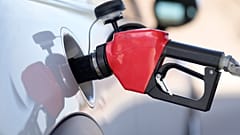 Fuel is pumped into a vehicle at a Costco gasoline station on Nov. 30, 2023, in Thornton, Colo.