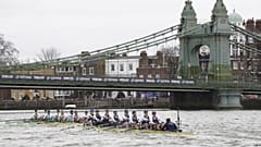 Oxford, right, and Cambridge pass under Hammersmith Bridgeduring the 168th Men's Boat Race 2023 on the River Thames, London, Sunday March 26, 2023.