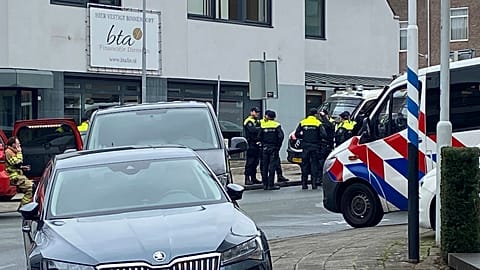 Police gather in Eden, Netherlands, Saturday, March 30, 2024. Heavily armed police have cordoned off part of a Dutch town and say that multiple people are being held hostage i