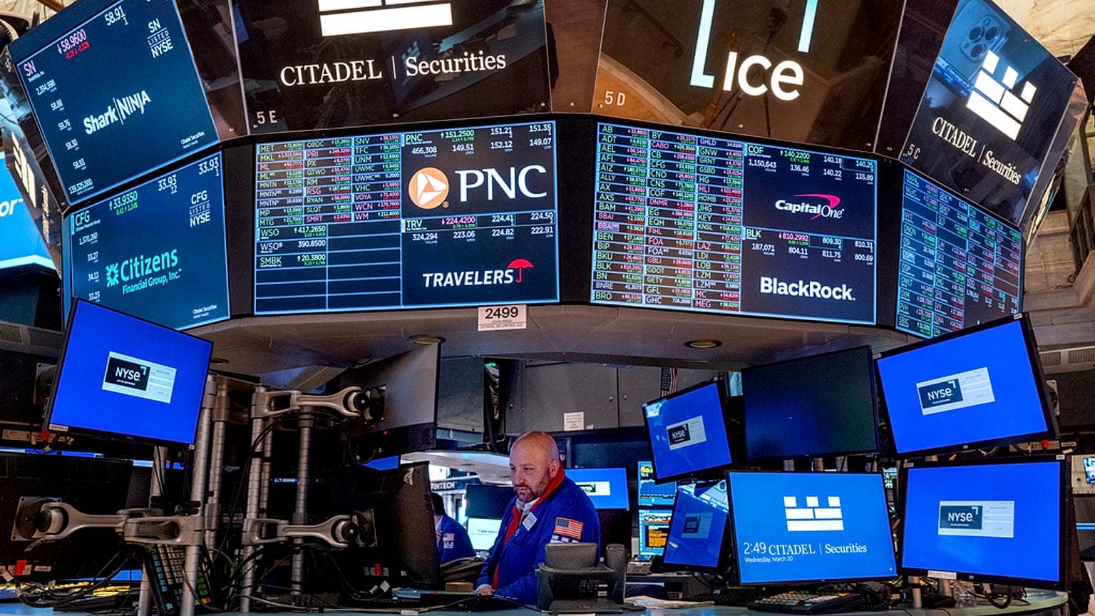 A trader working on the floor of the New York Stock Exchange 
