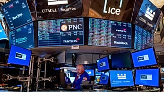 A trader working on the floor of the New York Stock Exchange 