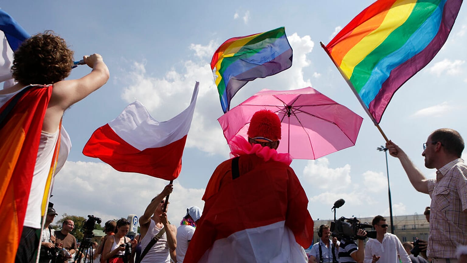 Protestors march through Warsaw downtown during the Euro Pride gay parade in Warsaw, Poland, Saturday, July 17, 2010.