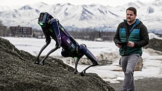 Alaska Department of Transportation program manager Ryan Marlow demonstrates the agency's robotic dog in Anchorage, Alaska, on 26 March 2024.