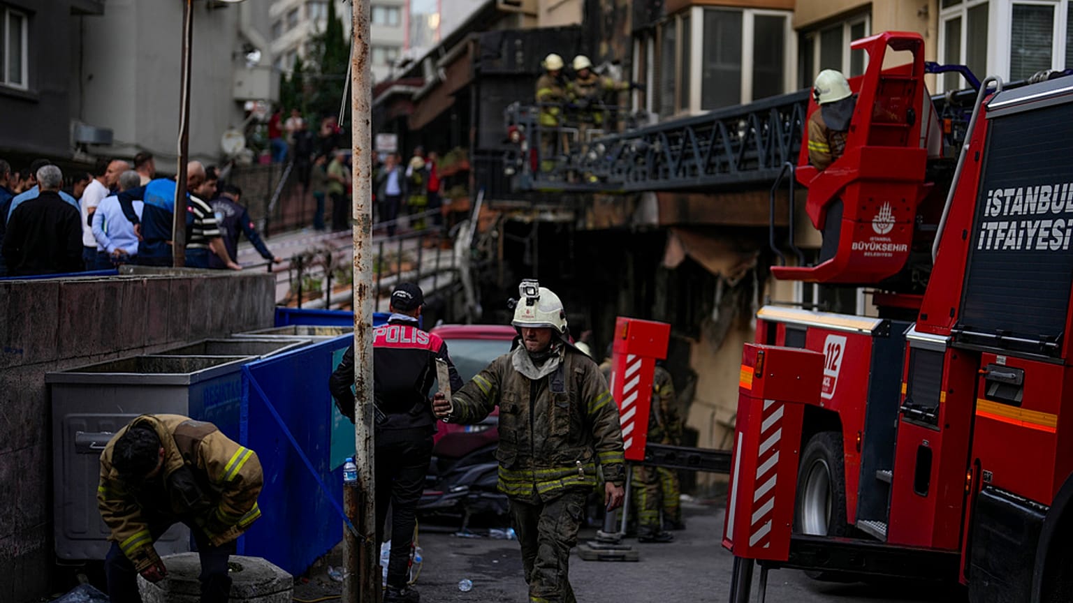 Firefighters and emergency teams work in the aftermath of a fire that broke out during day time in a nightclub in Istanbul, Turkey, Tuesday, April 2, 2024