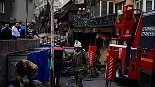 Firefighters and emergency teams work in the aftermath of a fire that broke out during day time in a nightclub in Istanbul, Turkey, Tuesday, April 2, 2024