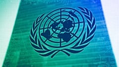 The symbol of the United Nations is displayed outside the Secretariat Building during an emergency meeting of the UN General Assembly, February 2022