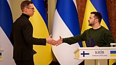 Finland's President Alexander Stubb, left, shakes hands with Ukraine's President Volodymyr Zelenskyy, after a press conference in Kyiv, Ukraine, Wednesday, April 3, 2024.