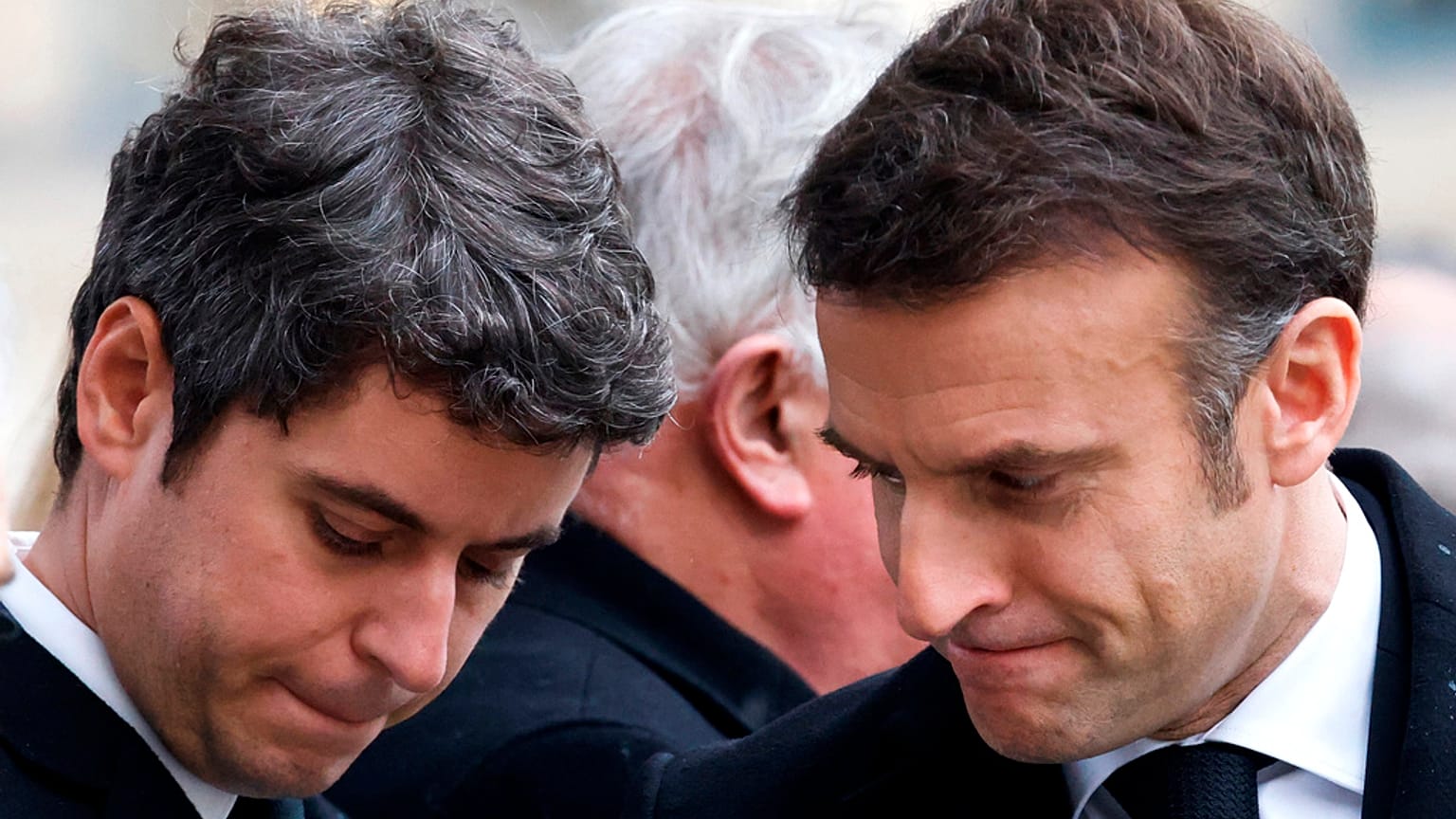 French President Emmanuel Macron, right, and Prime Minister Gabriel Attal attend a ceremony for former French justice minister Robert Badinter. Feb 14, 2024.