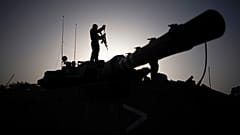 An Israeli troop on a tank. 