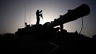 An Israeli troop on a tank. 