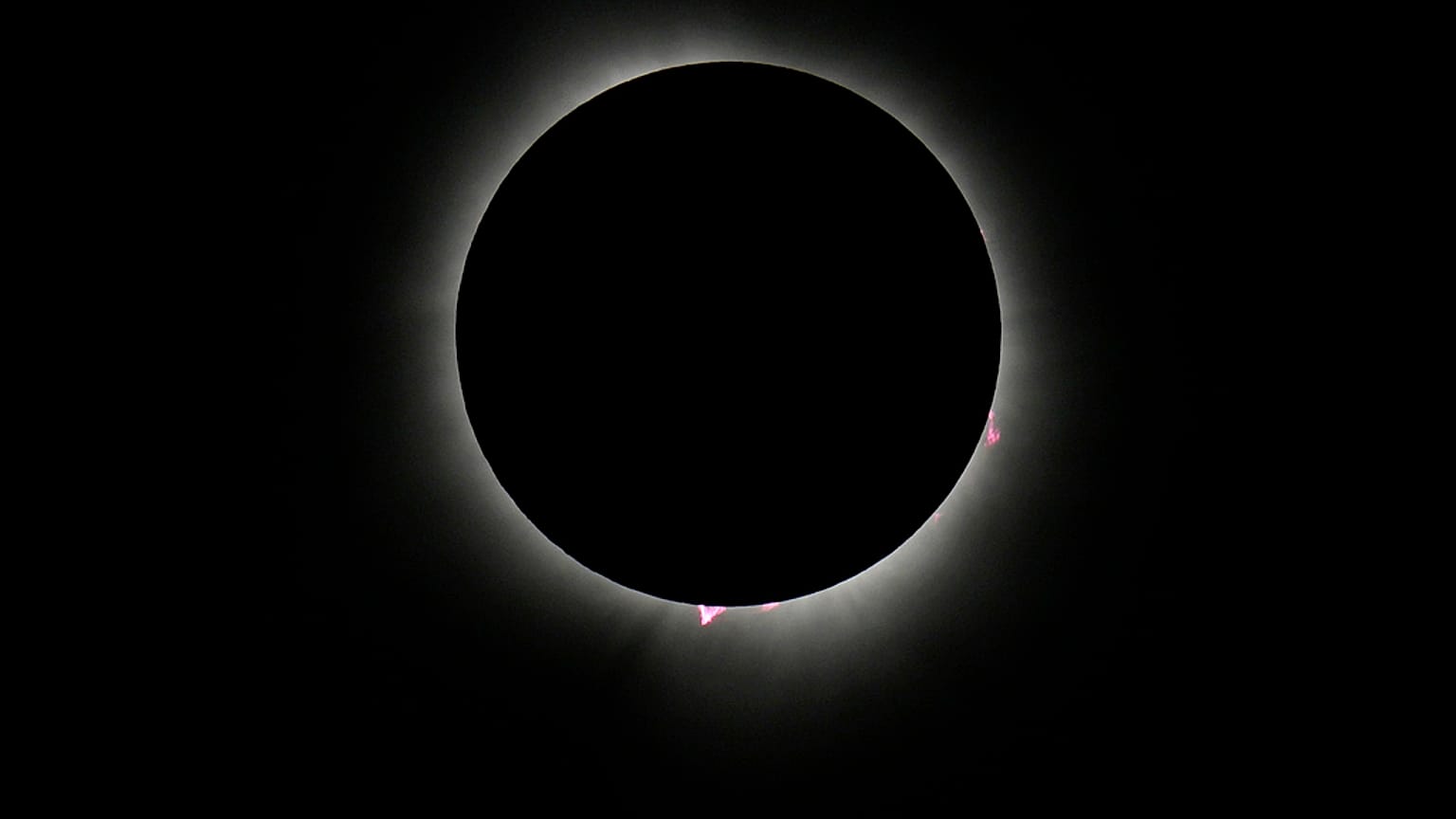 The moon covers the sun during a total solar eclipse Monday, April 8, 2024, as seen from Carbondale, Ill. 
