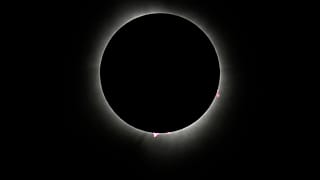 The moon covers the sun during a total solar eclipse Monday, April 8, 2024, as seen from Carbondale, Ill. 