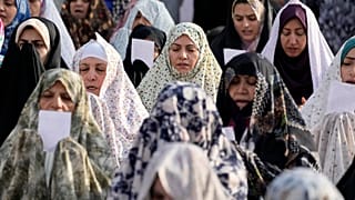 Iranian worshippers perform Eid al-Fitr prayer, marking the end of the Muslims holy fasting month of Ramadan in Tehran, Iran, Wednesday, April 10, 2024.