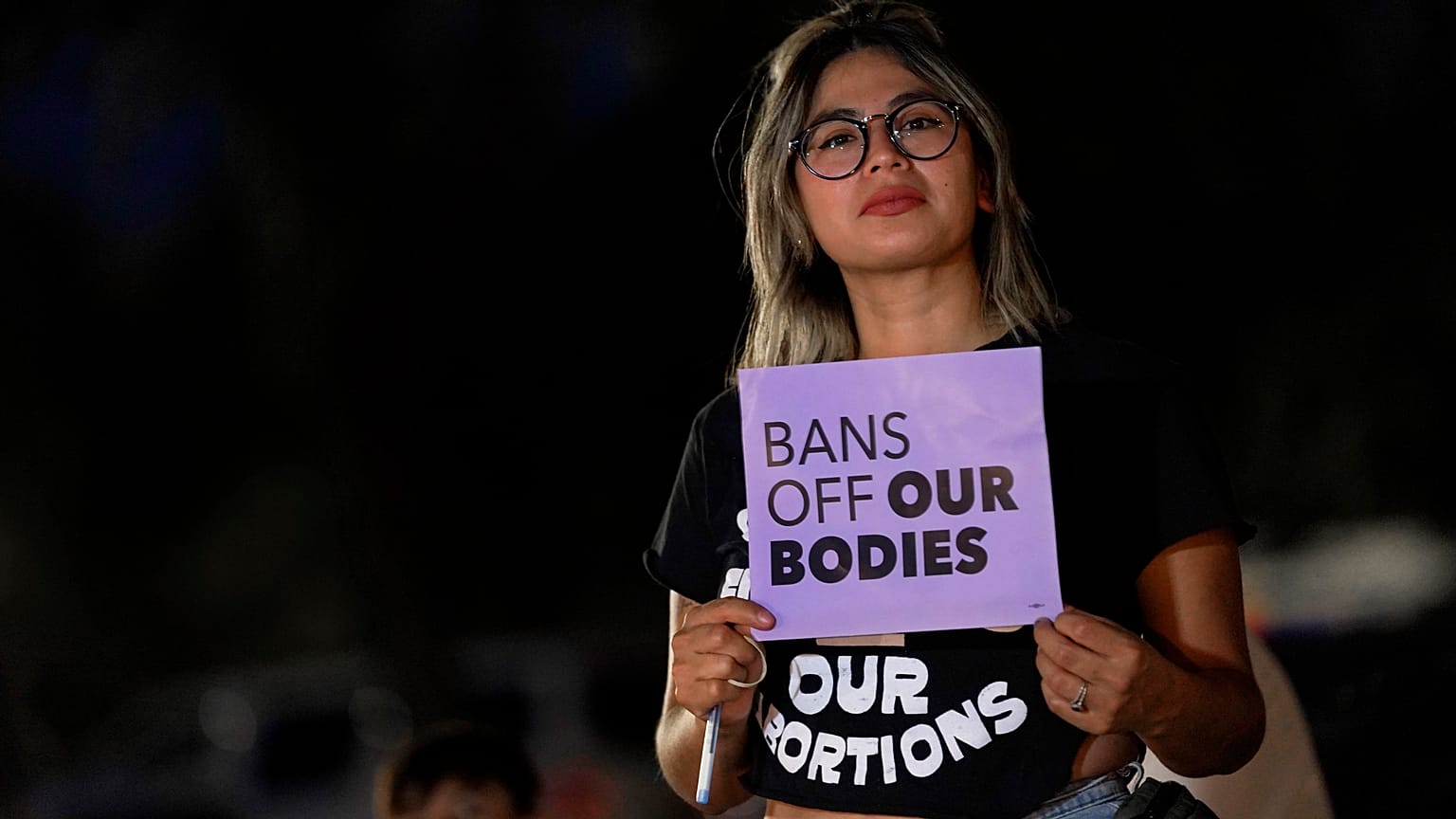 This file photo shows Celina Washburn at a protest on Sept. 23, 2022, outside the Arizona Capitol in Phoenix.