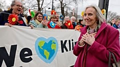 Switzerland's Rosmarie Wilder-Walti reacts as Swiss retirees demonstrate outside the European Court of Human Rights.