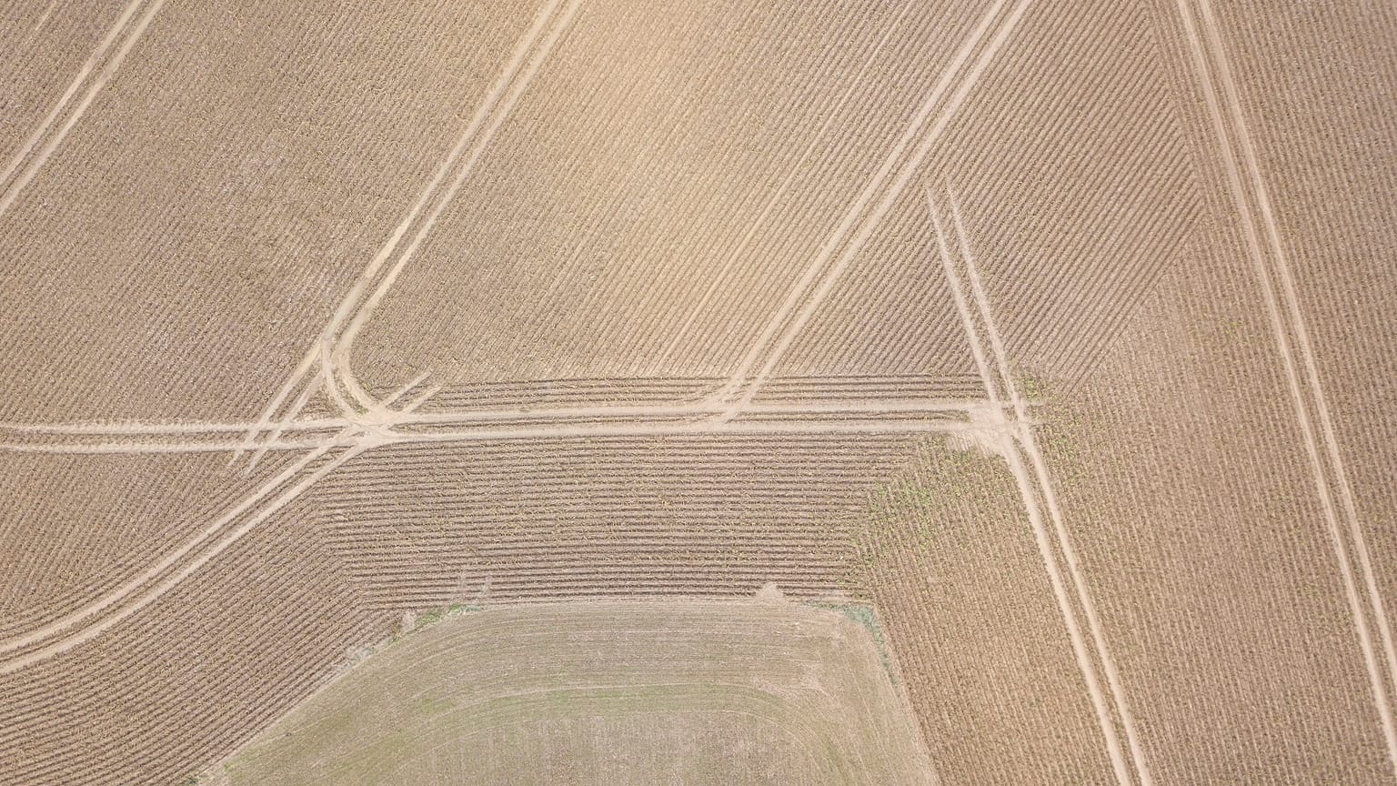Drone's eye view of a ploughed field in Belgium.